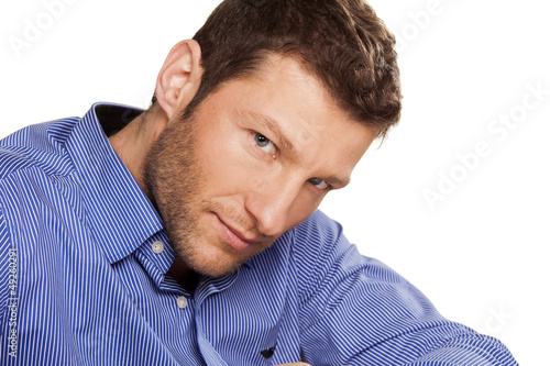 Photo: portrait of a handsome young man on white background portrait of a handsome young man on white background