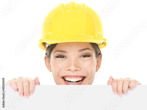 Photo: Construction worker / engineer woman showing sign Construction worker / engineer woman showing sign