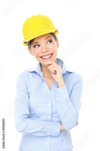 Photo: Engineer, entrepreneur or architect woman thinking Engineer, entrepreneur or architect woman thinking