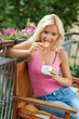 attractive woman eating outside