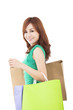 smiling young woman with shopping bags