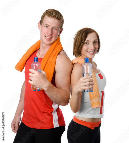 Photo: handsome man and girl holding a bottle with water handsome man and girl holding a bottle with water