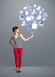 Pretty woman holding social icon balloon