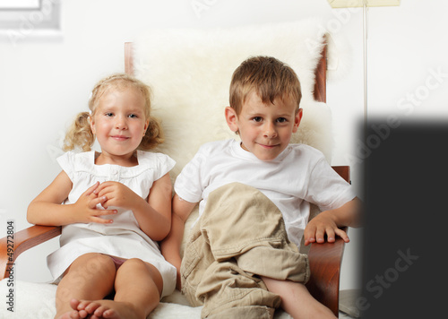 Photo: Children watching TV Children watching TV