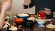 Friends having dinner at home, toasting