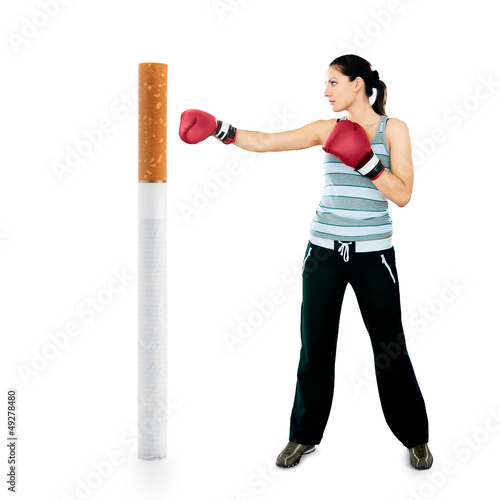 Photo: No smoking. Young girl boxing cigarette No smoking. Young girl boxing cigarette