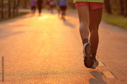 Photo: Feet of runner in evening light Feet of runner in evening light