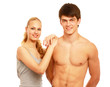 A young sportive couple, isolated on white background