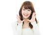 Beautiful asian woman relaxing on white background