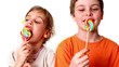 Video: Two kids boy and girl eat lollipops isolated Two kids boy and girl eat lollipops isolated