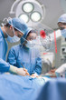 Photo: Surgeons using an interface for operating Surgeons using an interface for operating