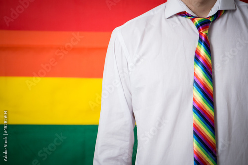 Photo: Man wearing shirt and rainbow tie Man wearing shirt and rainbow tie