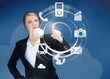 Photo: Businesswoman using wheel application interface Businesswoman using wheel application interface