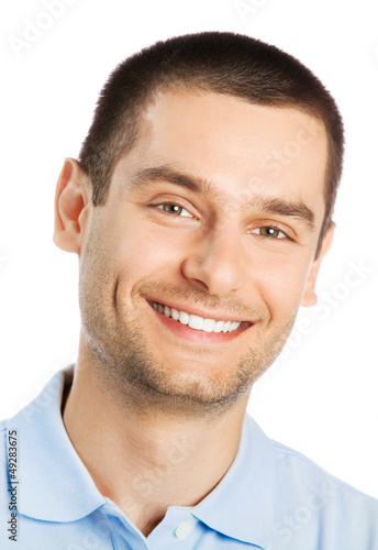 Photo: Cheerful young man, over white Cheerful young man, over white