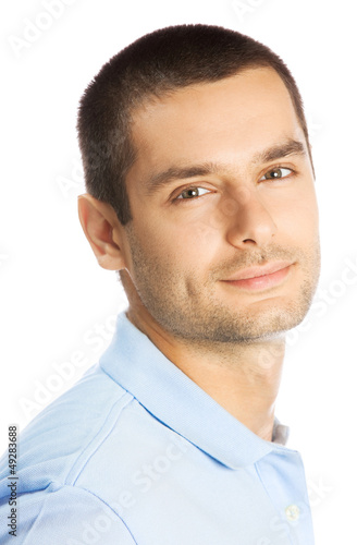 Photo: Cheerful young man, over white Cheerful young man, over white