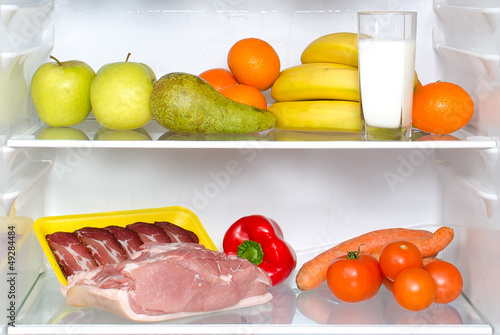 Photo: Open fridge full of fruits, vegetables and meat Open fridge full of fruits, vegetables and meat