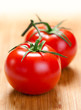 Photo: Two tomatoes on the board. Two tomatoes on the board.
