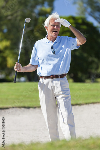 Photo: Happy Senior Man Playing Golf In Bunker Happy Senior Man Playing Golf In Bunker