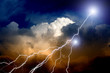 Lightnings in sunset sky