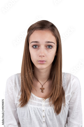 Photo: Portrait of a young teenage girl isolated on white Portrait of a young teenage girl isolated on white