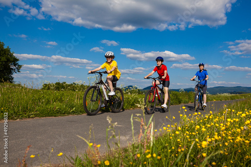 Photo: Active family biking Active family biking