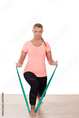 Photo: Woman working out with a strap Woman working out with a strap
