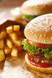 Two hamburgers and french fries
