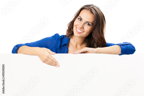 Photo: Young woman with blank signboard, on white Young woman with blank signboard, on white