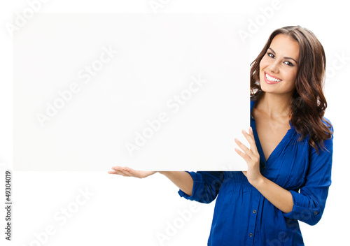 Photo: Young woman with blank signboard, on white Young woman with blank signboard, on white