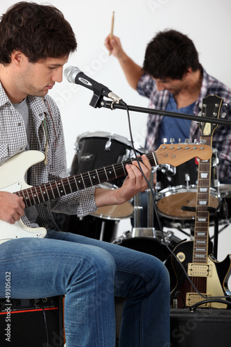 Photo: Rock group rehearsing Rock group rehearsing