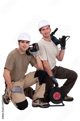 Photo: duo of proud electricians duo of proud electricians