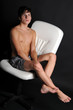 Shirtless teenager