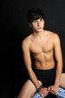 Shirtless teenager