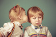 Vintage girl and boy on a green background.