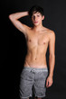 Shirtless teenager