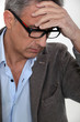 Stressed middle-aged businessman