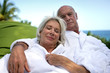 Mature couple enjoying spa weekend at the beach