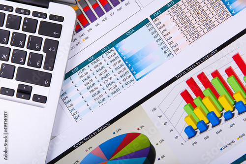 Photo: Financial papers on the table Financial papers on the table