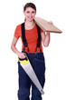 Woman carrying plywood and a saw