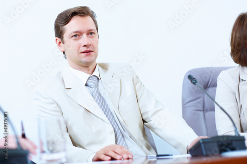 Photo: Businessman at meeting Businessman at meeting