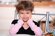 Girl sitting at table
