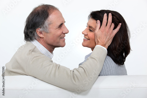 Photo: Man stroking his wife's head Man stroking his wife's head