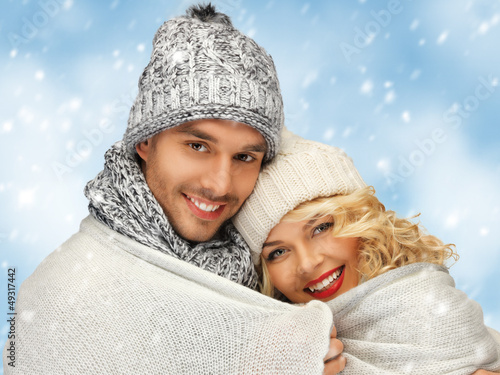 Photo: family couple in a winter clothes family couple in a winter clothes