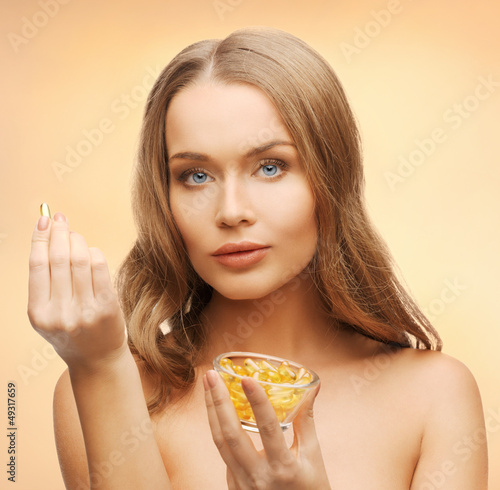 Photo: woman with vitamins woman with vitamins
