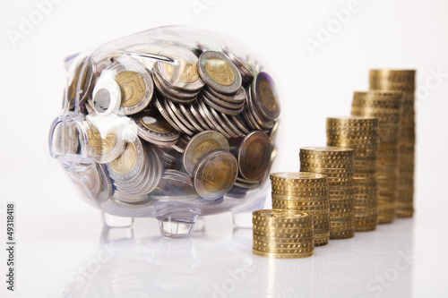 Photo: Pig bank and money Pig bank and money