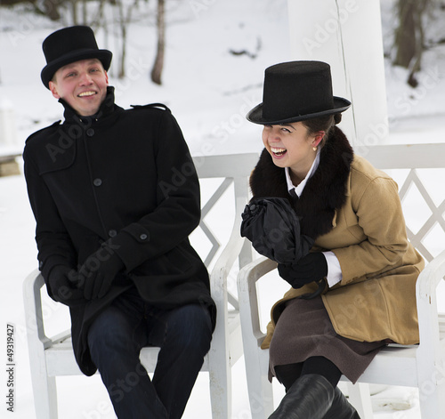 Photo: Man and woman laugh over some joke Man and woman laugh over some joke