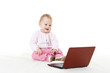 Sweet baby with laptop.