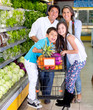 Happy family at the supermarket