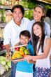 Healthy family at the local market