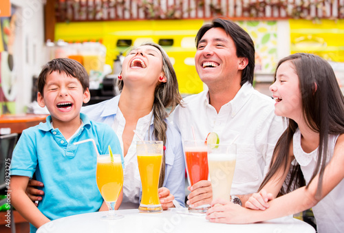 Photo: Happy family at the diner Happy family at the diner